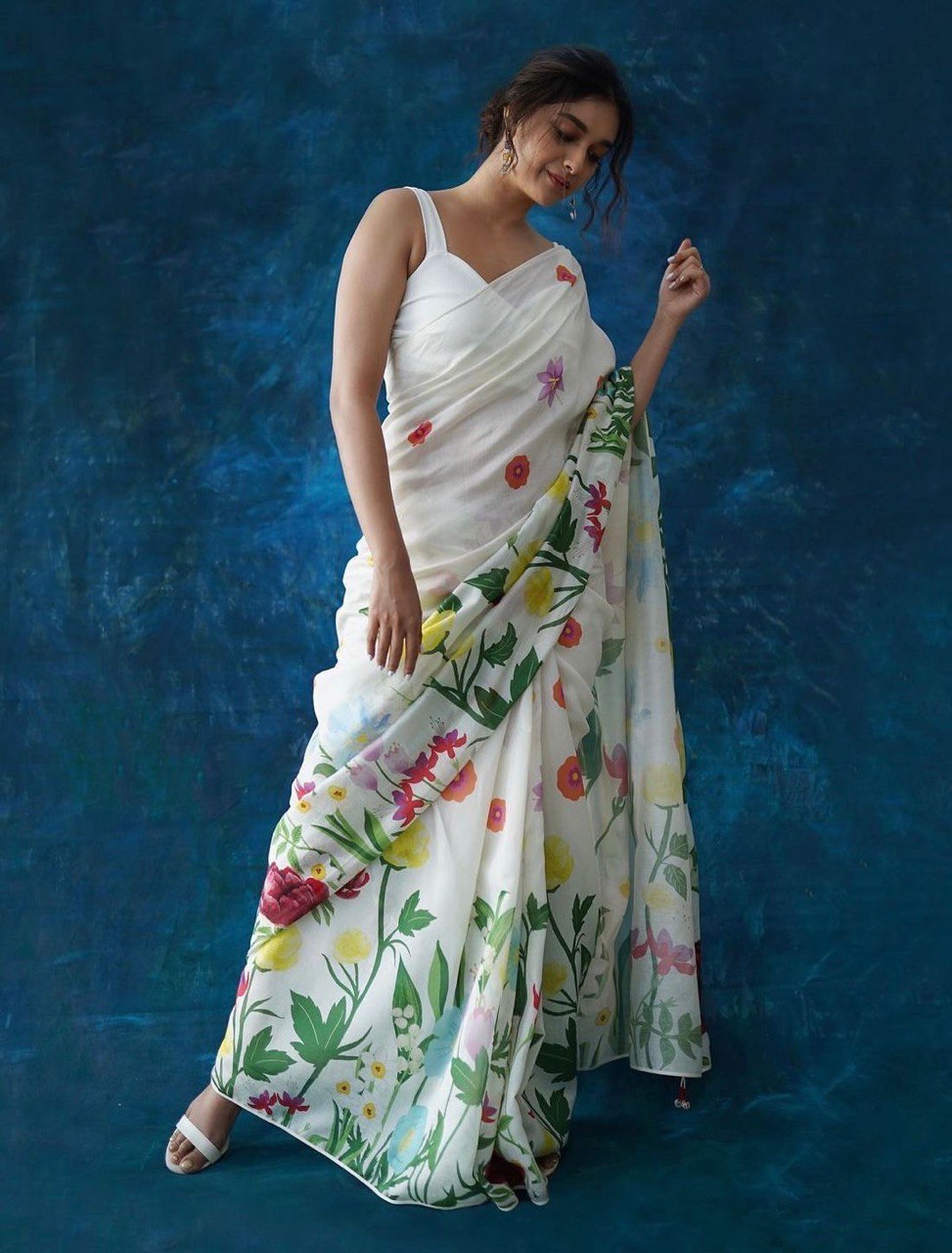 Plain Linen sarees with digital print blouse.