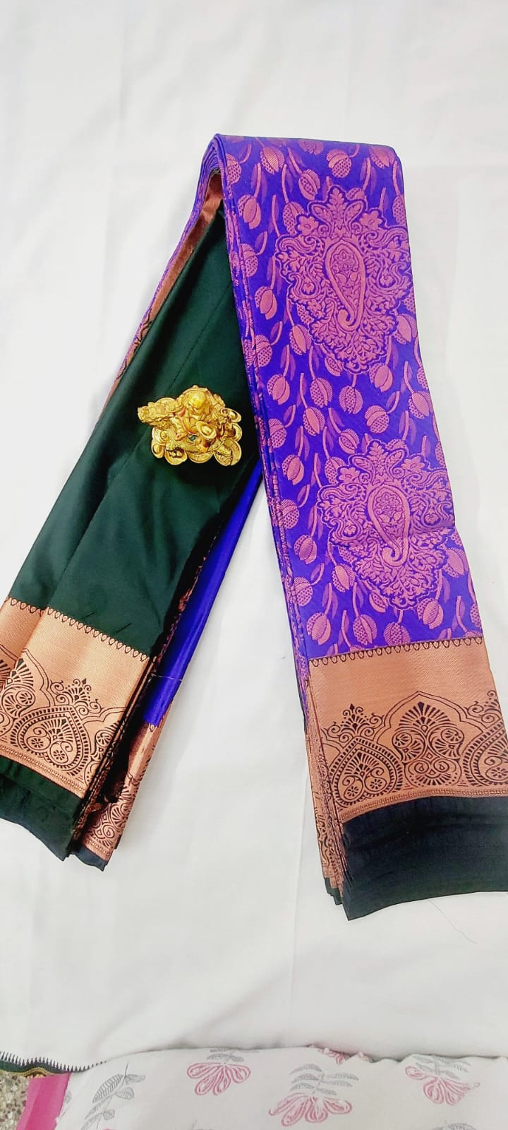 Soft silk saree with copper zari border and zari floral design